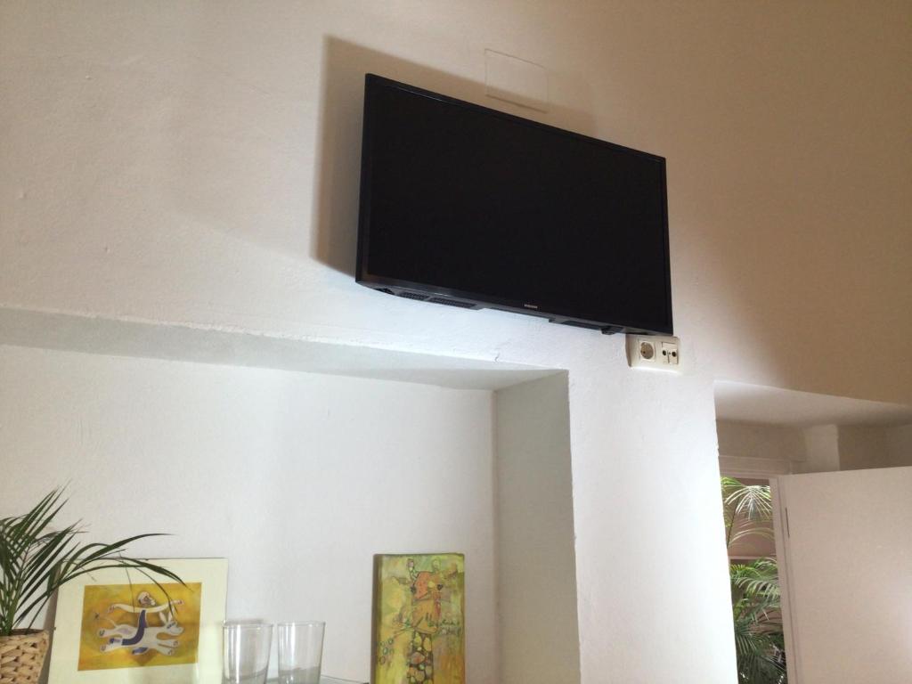 TV a/nebo společenská místnost v ubytování Santo Domingo - Centro