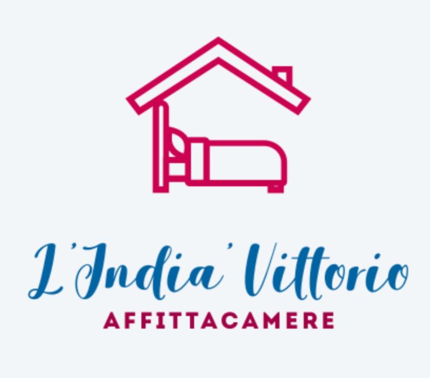 En logo, et sertifikat eller et firmaskilt på L'Indià Vittorio Affittacamere