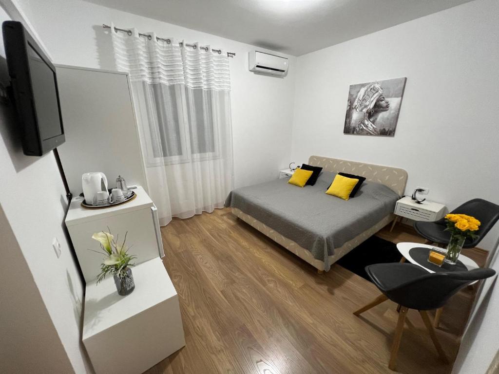 Posteľ alebo postele v izbe v ubytovaní Guest House Anna