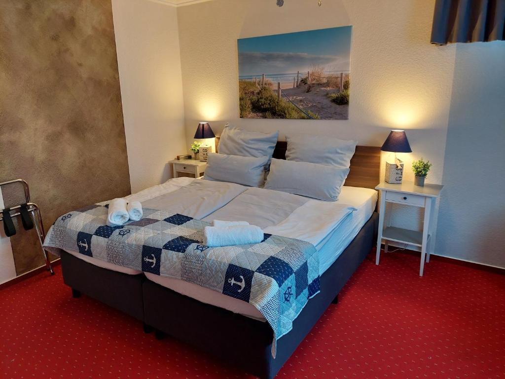 Postel nebo postele na pokoji v ubytování Hotel Rosmarin
