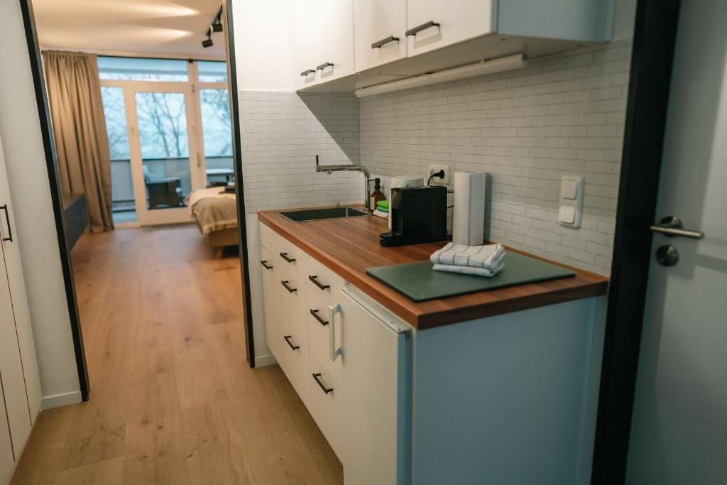 Kuchyň nebo kuchyňský kout v ubytování Möhneblick - Seeblick, Dachterrasse, Pool, Sauna, Waldnähe