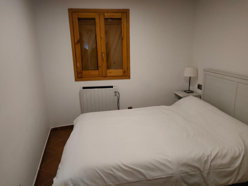 Posteľ alebo postele v izbe v ubytovaní Apartment in Llavorsi in the heart of the Catalan Pyrenees