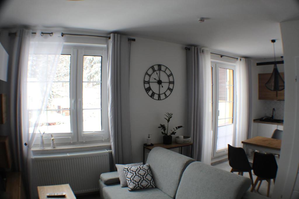 Posedenie v ubytovaní Apartament pod Świerkami