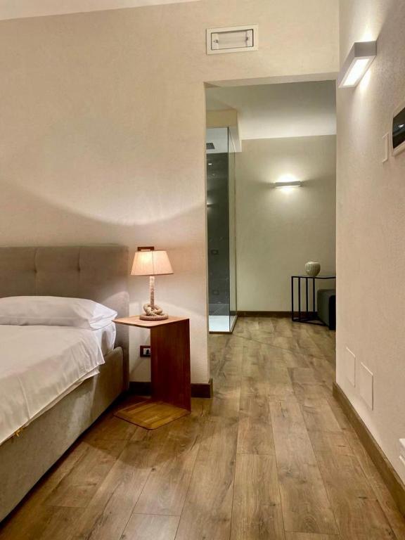 Letto o letti in una camera di Residence Dalco Suites & Apartments