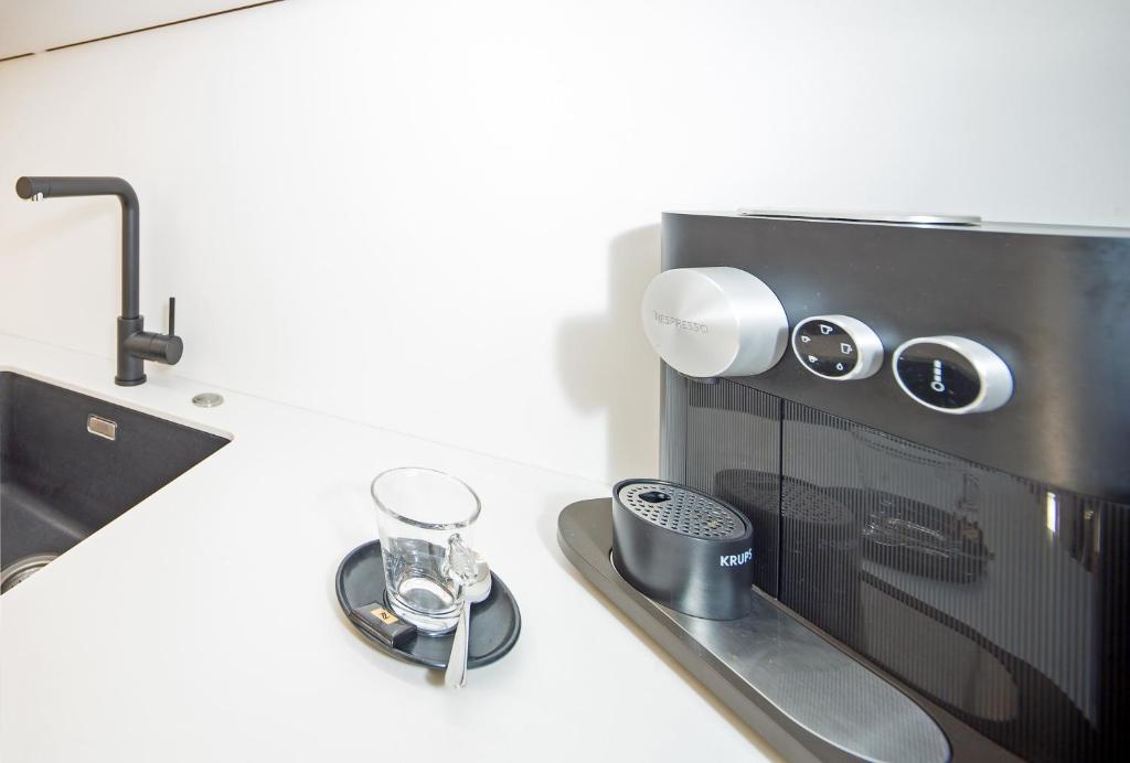 Kuchyň nebo kuchyňský kout v ubytování CitySuite Lienz