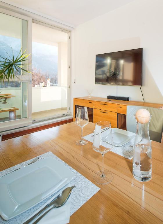 TV a/nebo společenská místnost v ubytování CitySuite Lienz