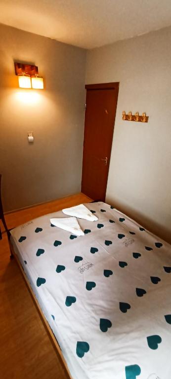 Postel nebo postele na pokoji v ubytování Rose House