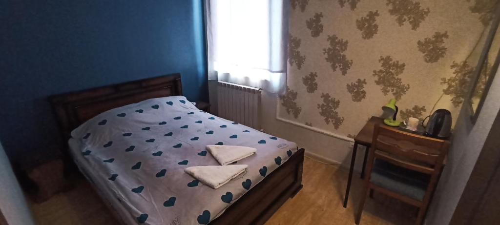 Postel nebo postele na pokoji v ubytování Rose House