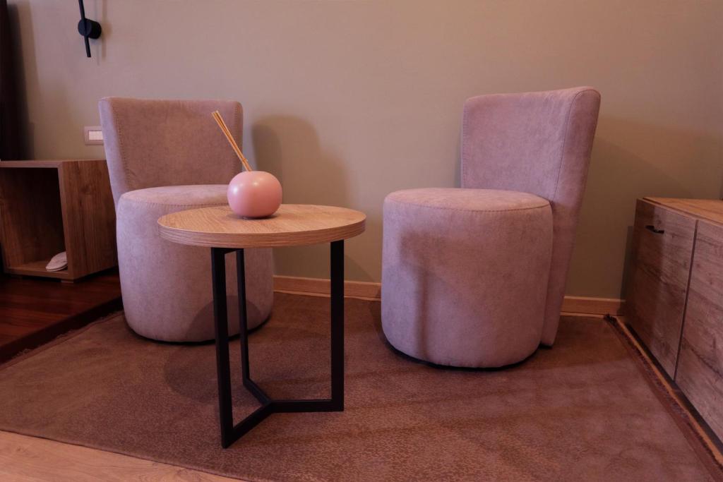 Posezení v ubytování Manhattan Room & Suite