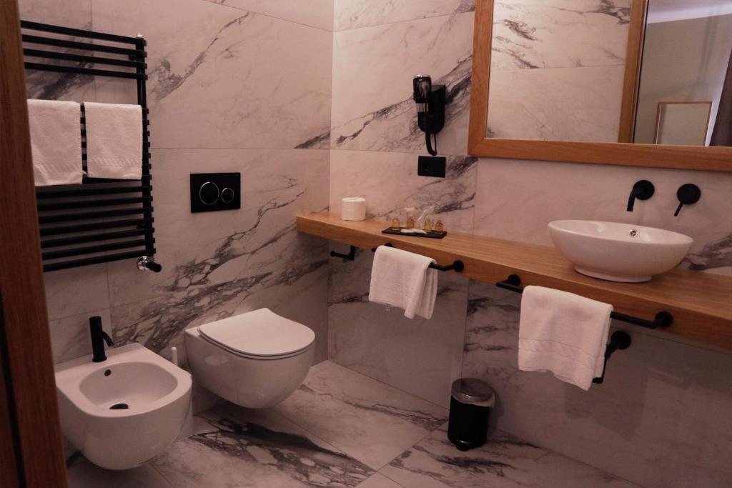 Koupelna v ubytování Manhattan Room & Suite