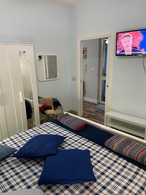 Posteľ alebo postele v izbe v ubytovaní La casa di Gioggiò