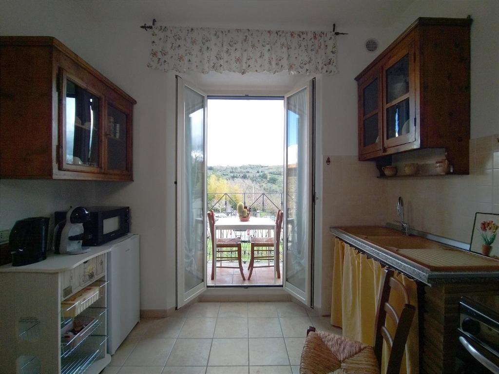 Kuchyňa alebo kuchynka v ubytovaní Casa Lidia