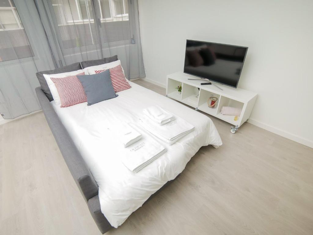 TV a/nebo společenská místnost v ubytování CM Vintage Apartments