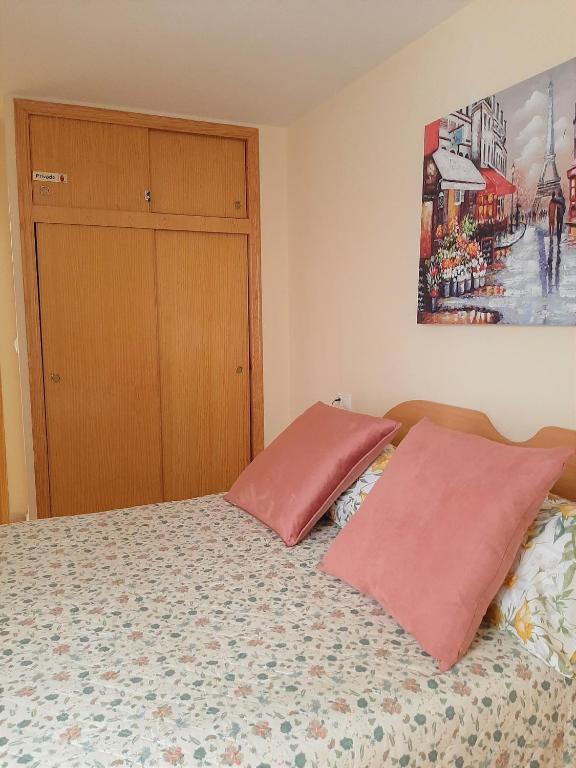 Posteľ alebo postele v izbe v ubytovaní Precioso apartamento con ascensor a 80 metros del mar