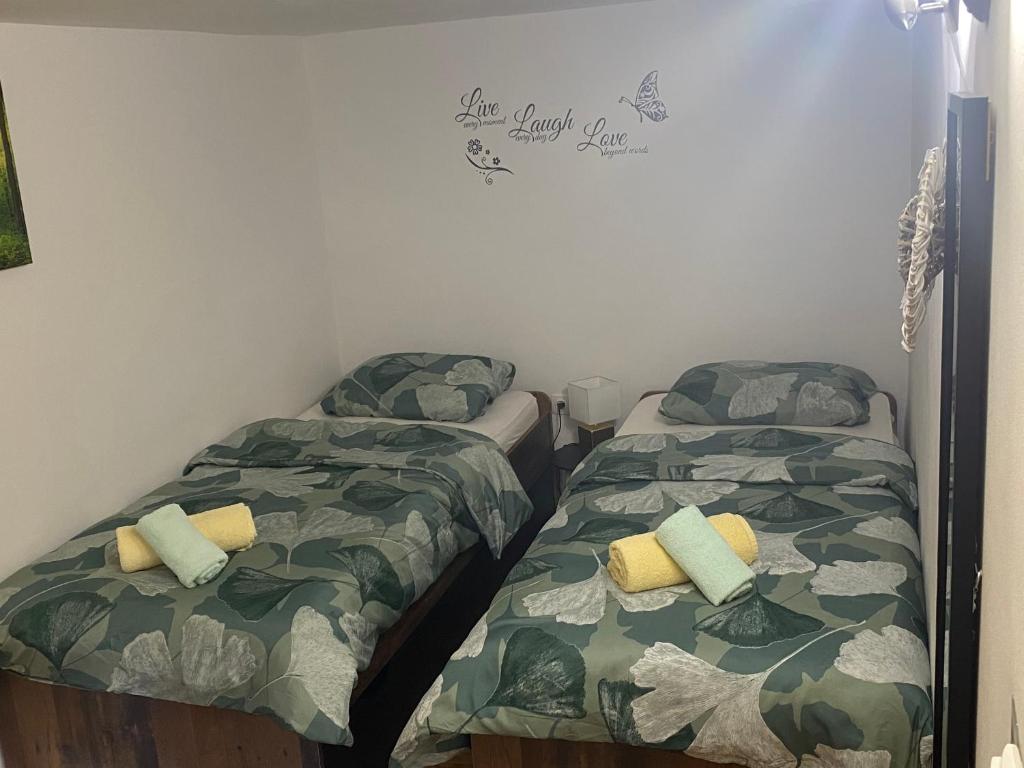 Posteľ alebo postele v izbe v ubytovaní Apartman Tia