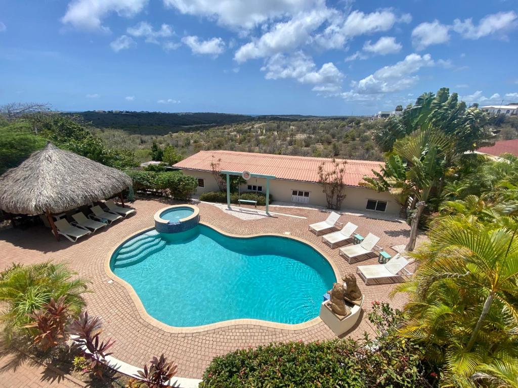 Utsikt över poolen vid Home Sweet Home Jan Thiel Curacao best view eller i närheten