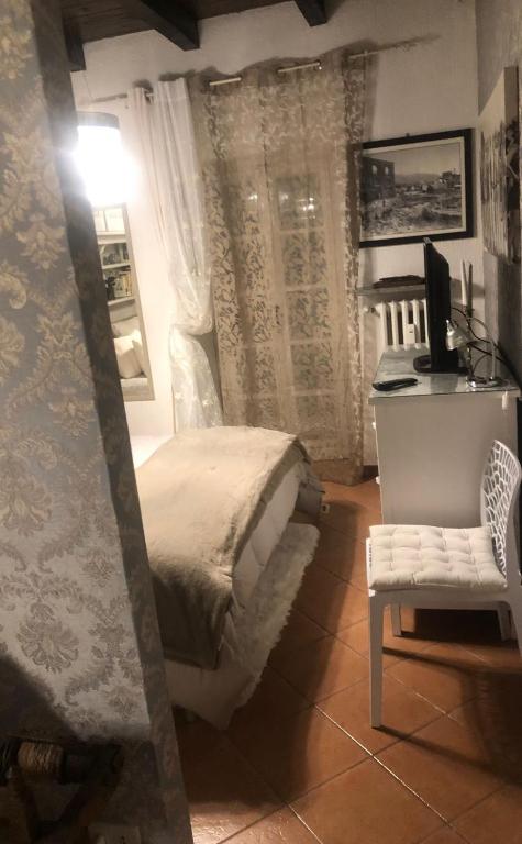 Postel nebo postele na pokoji v ubytování Ancienne Maisonnette
