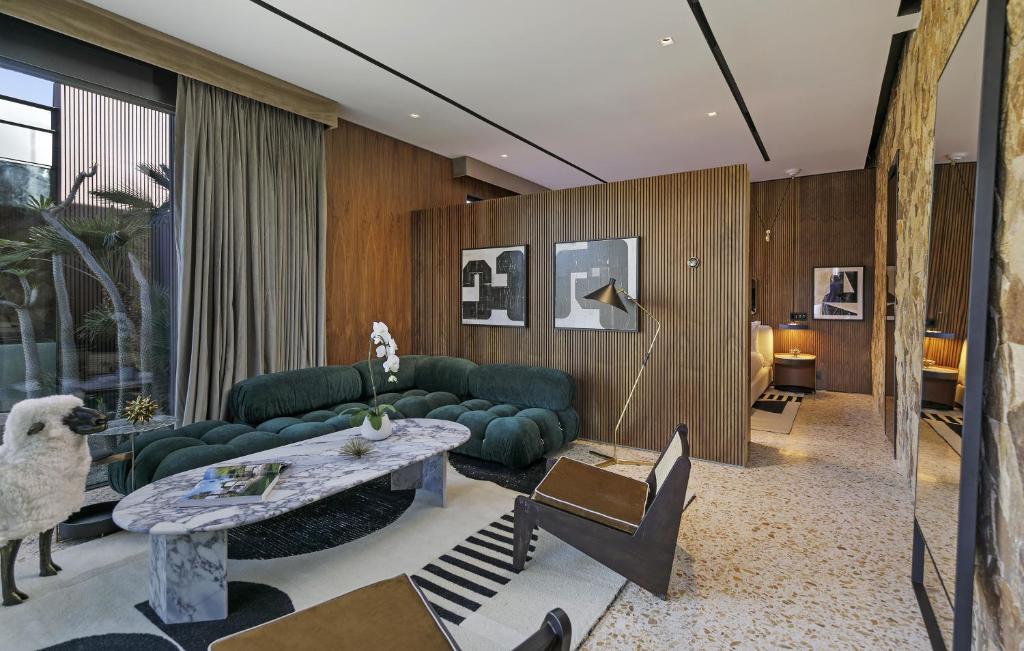 Posezení v ubytování L'Horizon Resort & Spa, Hermann Bungalows