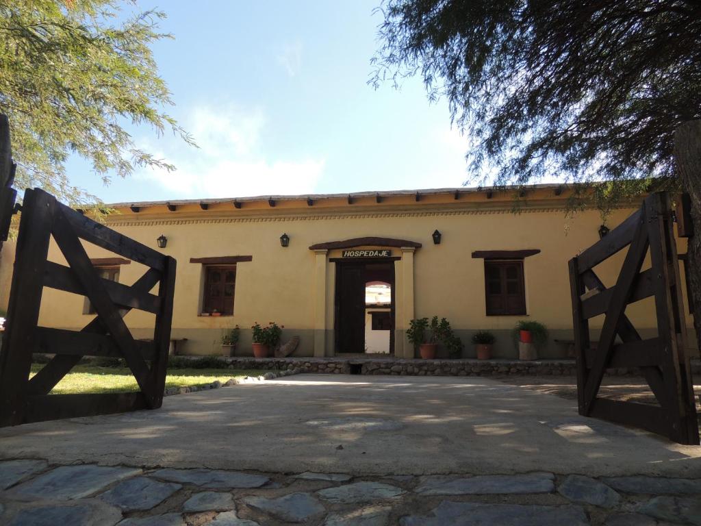 a building with a gate in front of it at El Rancho de Manolo in Molinos