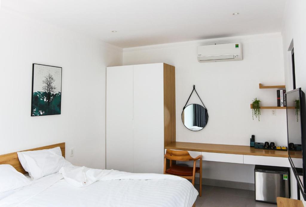 Postel nebo postele na pokoji v ubytování Minh Hai Resort