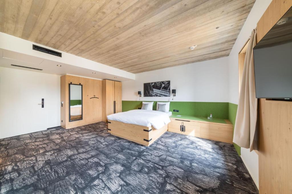 Postel nebo postele na pokoji v ubytování De BrauHotel