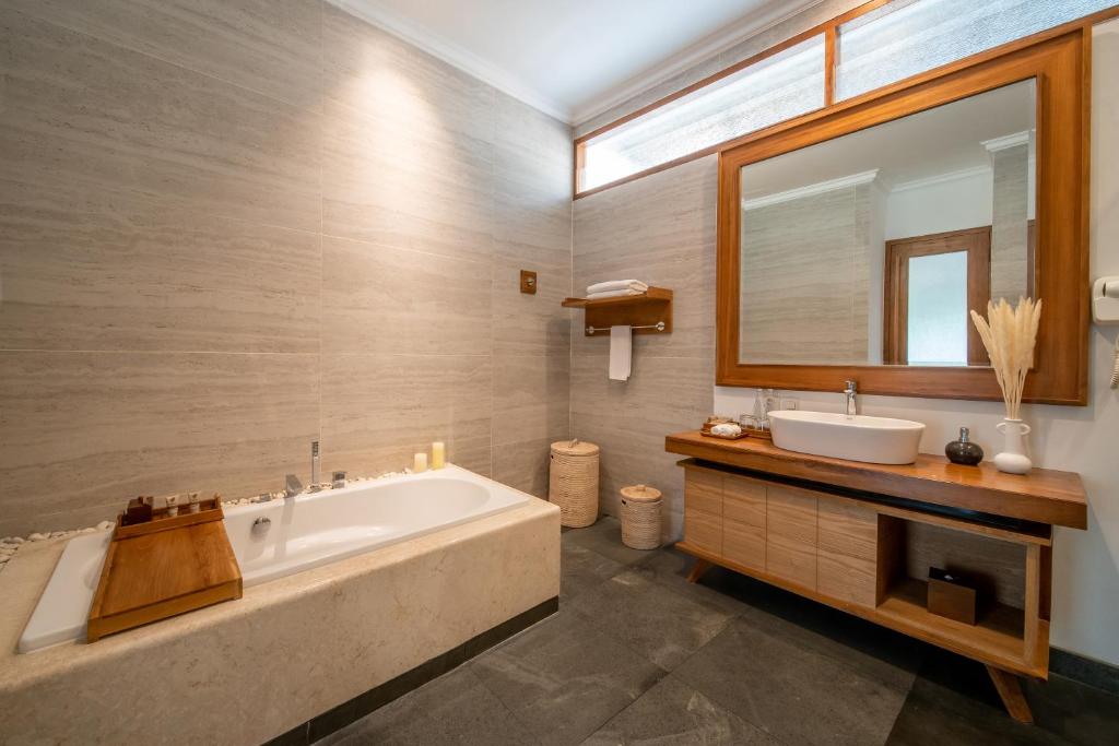 Koupelna v ubytování Harsono Boutique Resort Bali
