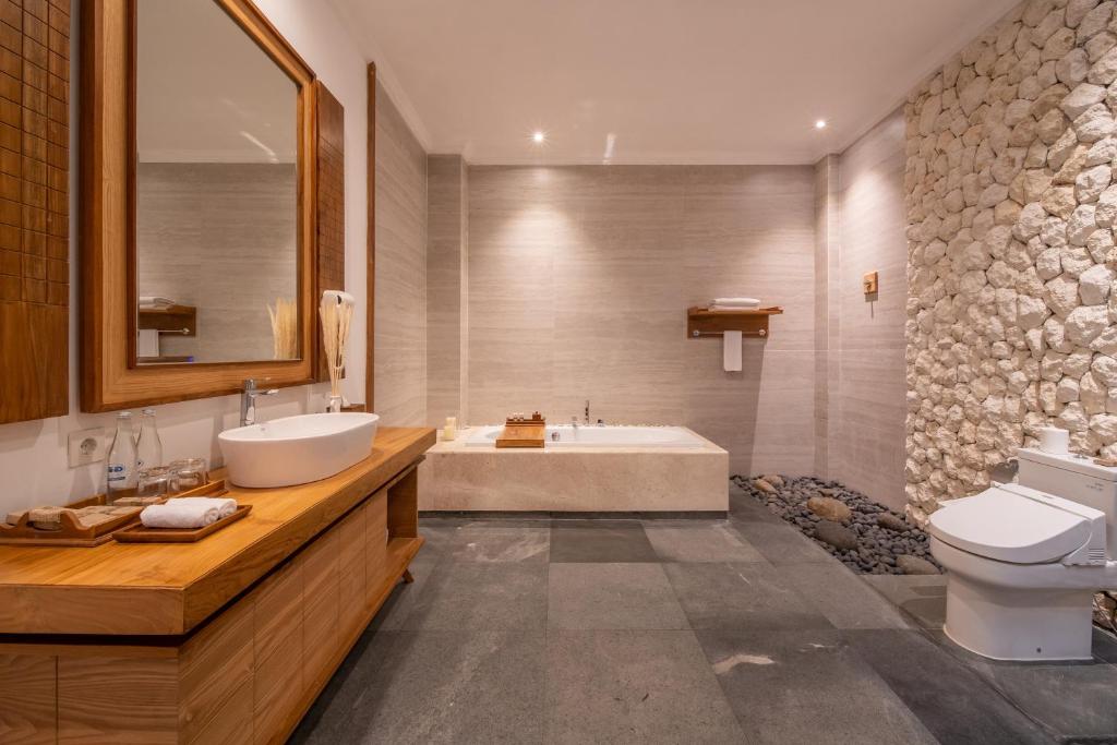 Koupelna v ubytování Harsono Boutique Resort Bali