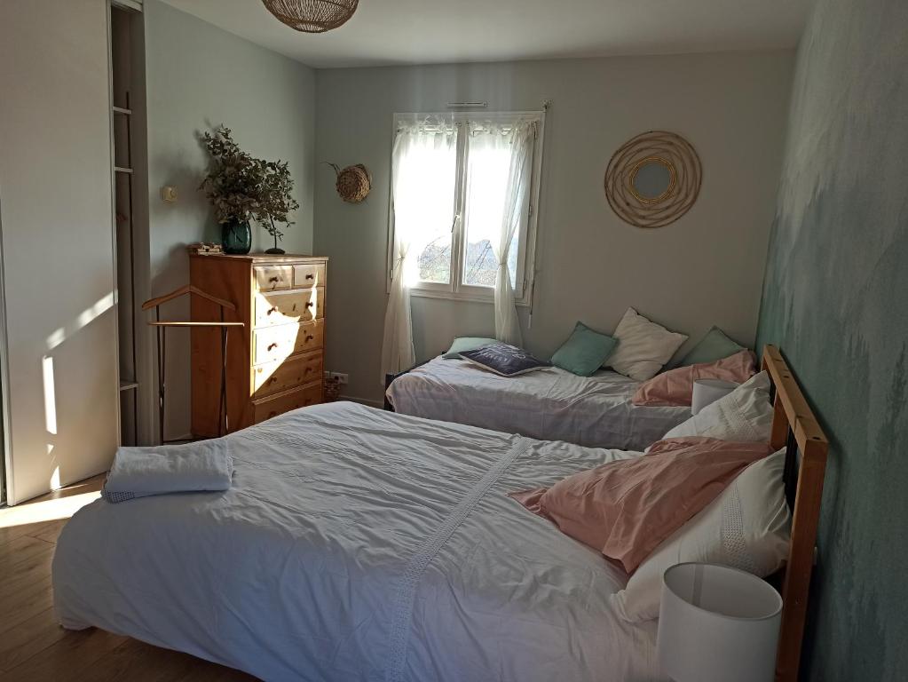 Postel nebo postele na pokoji v ubytování Chez Chantal