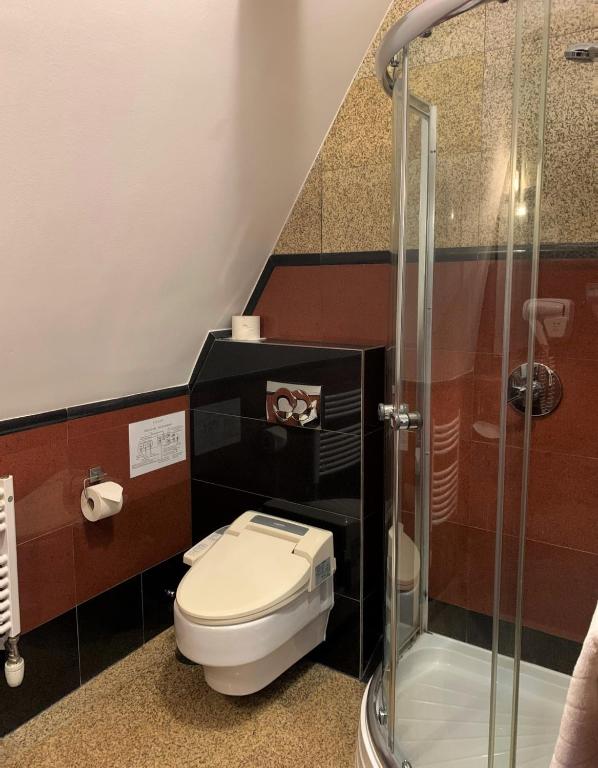 Koupelna v ubytování Hotel Solaris