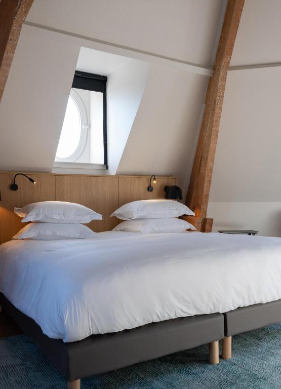 Postel nebo postele na pokoji v ubytování Le Château De Beaulieu