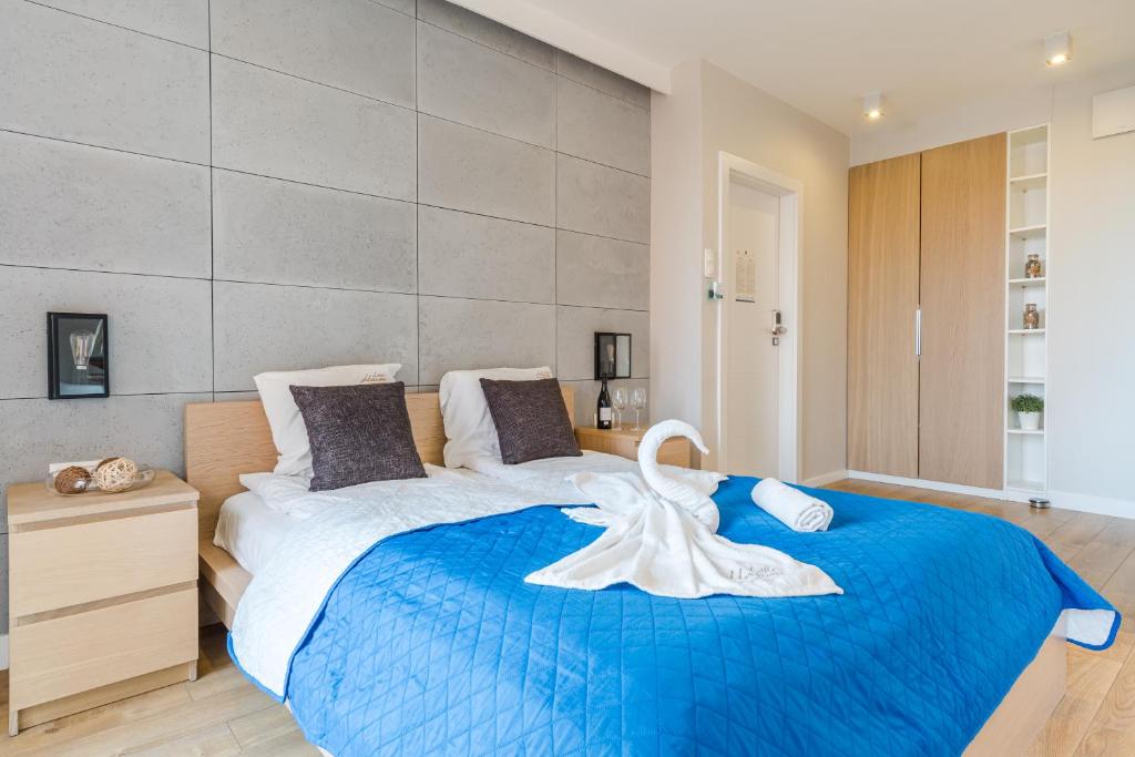 Postel nebo postele na pokoji v ubytování Littleheaven Studia & Apartmenty