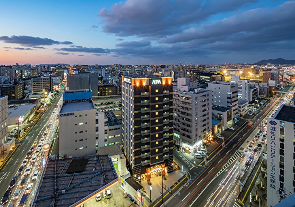 a view of a city at night with traffic at APA Hotel Hakata Higashihieekimae in Fukuoka