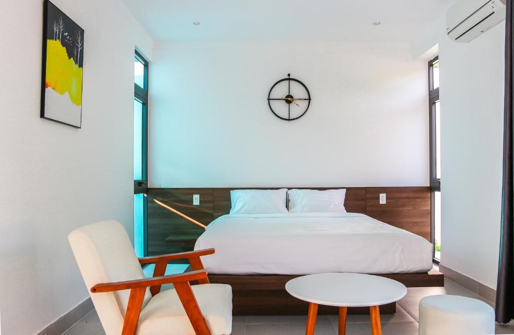 Postel nebo postele na pokoji v ubytování Minh Hai Resort
