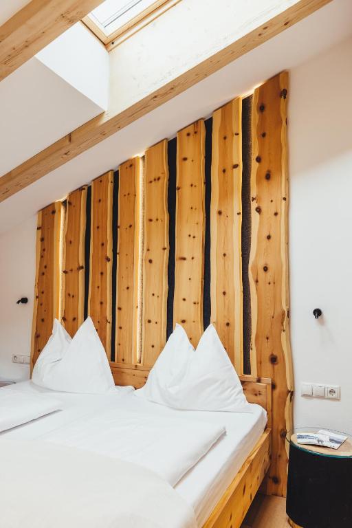 Postel nebo postele na pokoji v ubytování Hotel Schmuckhof