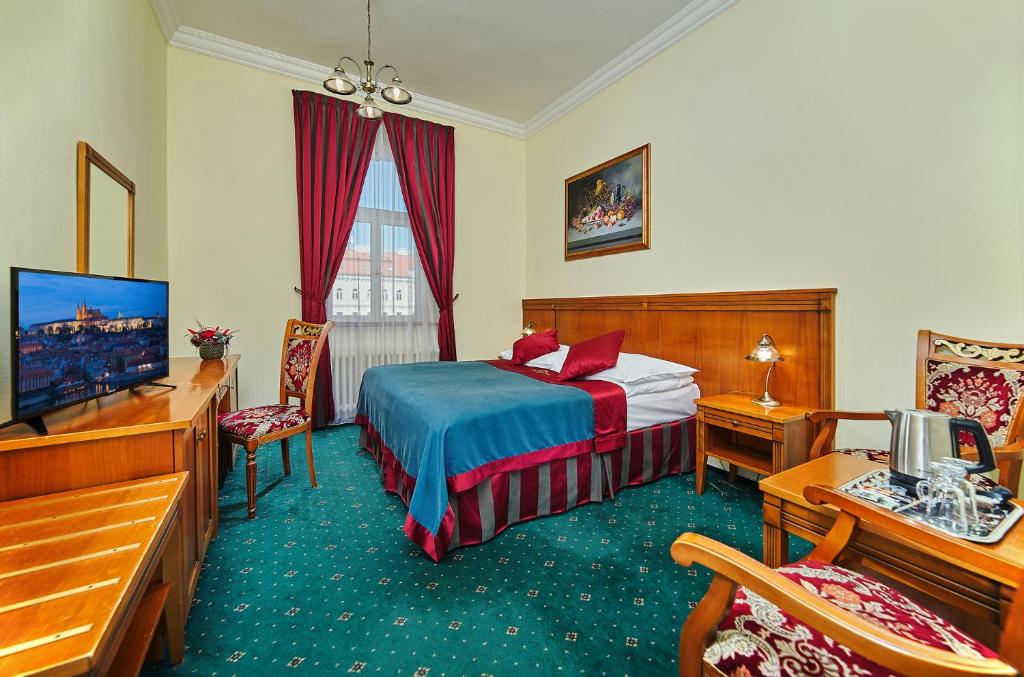 Postel nebo postele na pokoji v ubytování Green Garden Hotel