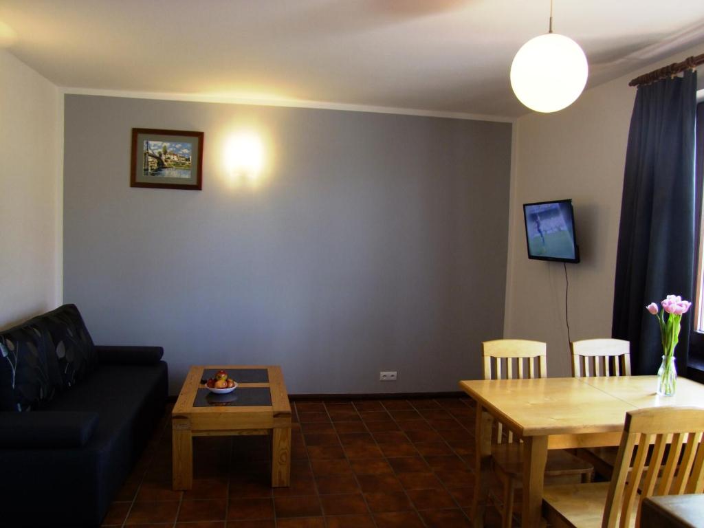 Posezení v ubytování Mazurski Zakątek-Apartamenty