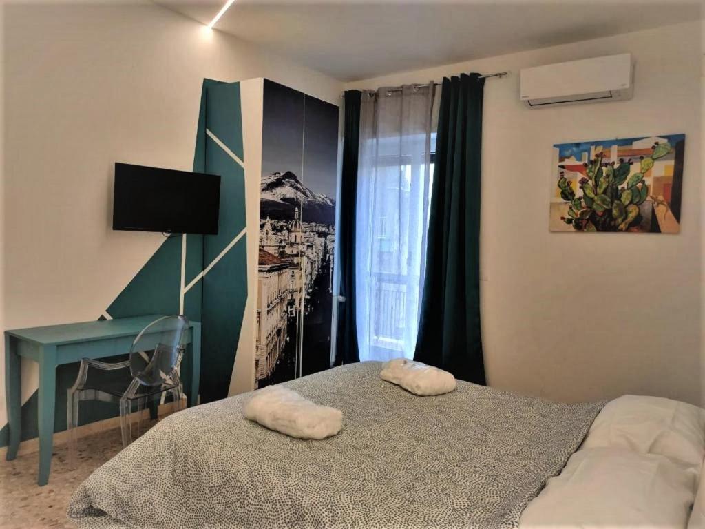 Posteľ alebo postele v izbe v ubytovaní Catania Apartment Borgo Suite Autonomous