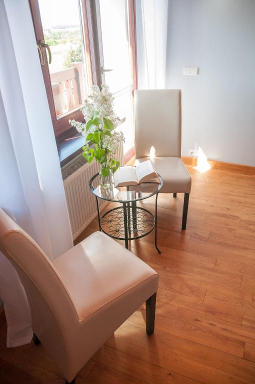 Posezení v ubytování Mazurski Zakątek-Apartamenty