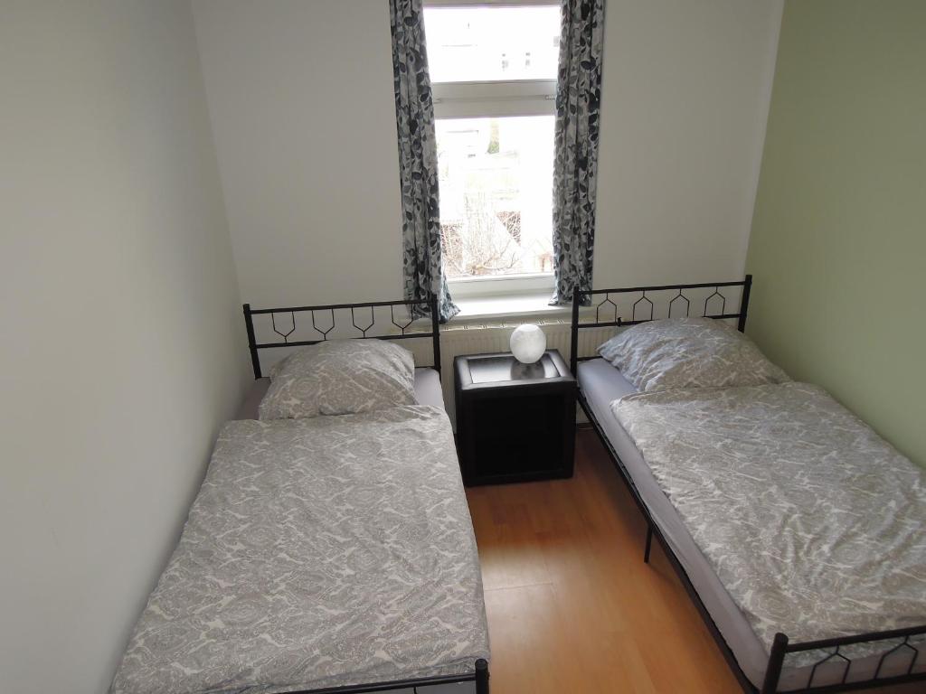 Postel nebo postele na pokoji v ubytování Ferienwohnung Nordluft