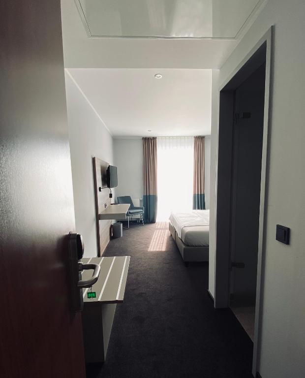 TV a/nebo společenská místnost v ubytování AiREA Hotel