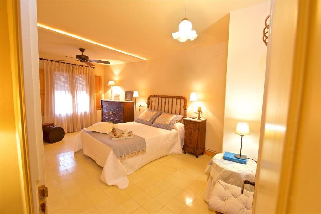 A bed or beds in a room at Cal Barceló