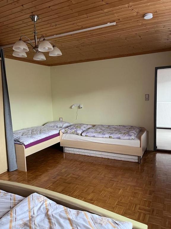 Postel nebo postele na pokoji v ubytování Haus Petra