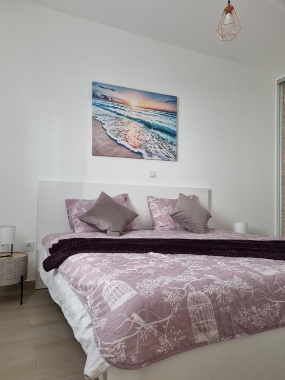 Postel nebo postele na pokoji v ubytování Sea spirit Šimuni