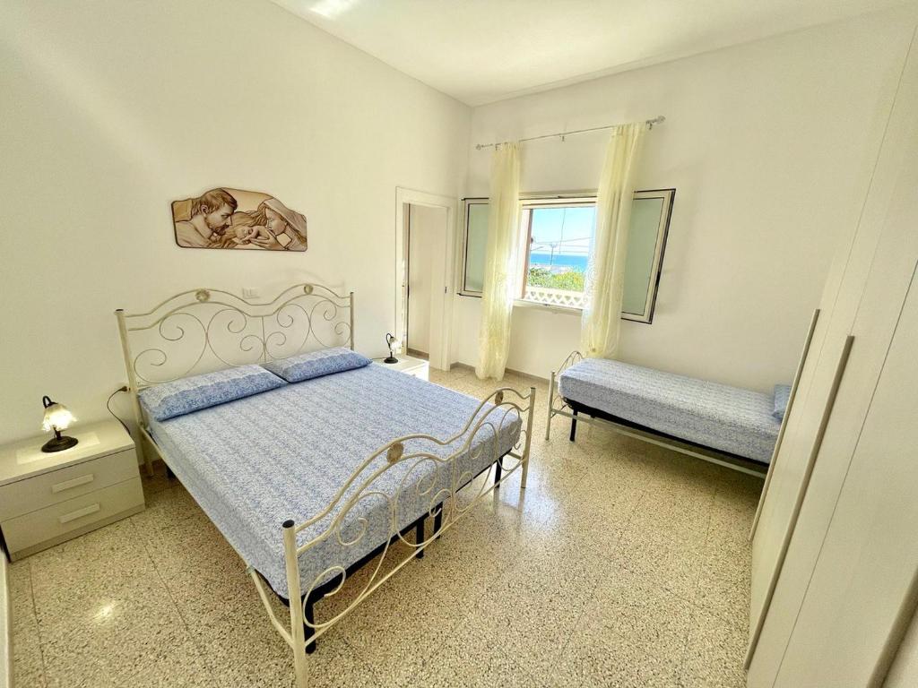 Posteľ alebo postele v izbe v ubytovaní Le macchie - Vacanza nel verde