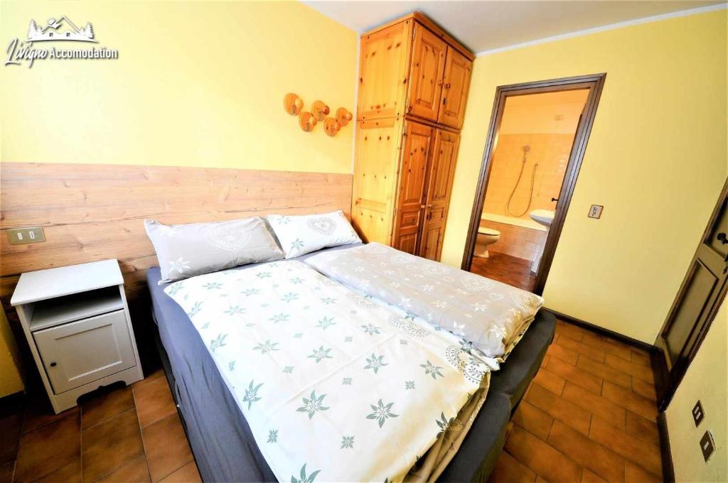 Posteľ alebo postele v izbe v ubytovaní Baite Costaccia App 3 by Livigno Accomodation
