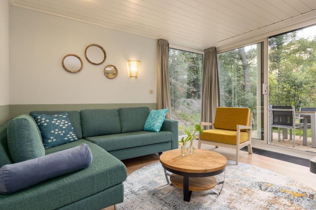 Posezení v ubytování Center Parcs Vossemeren