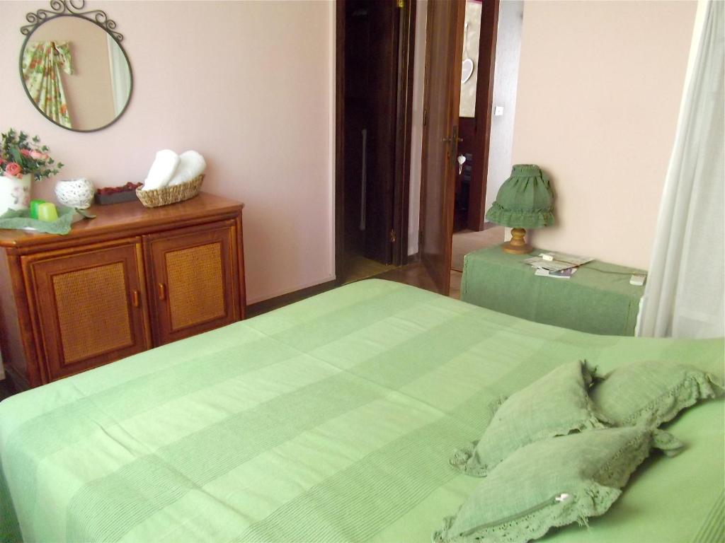 Postel nebo postele na pokoji v ubytování B&B Abano Garden