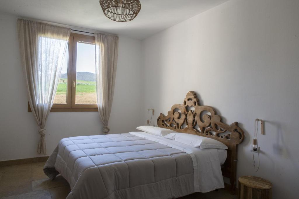 Postel nebo postele na pokoji v ubytování Agriturismo Casa Ricci
