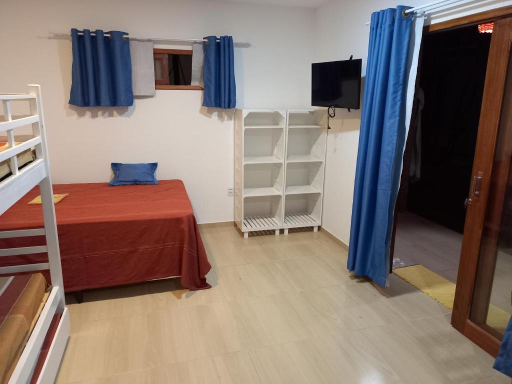 Postel nebo postele na pokoji v ubytování VILA ACONCHEGO GAMELEIRA
