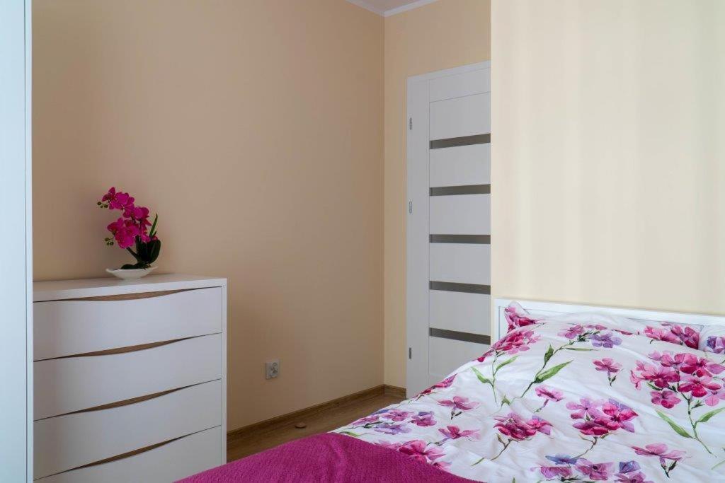 Posteľ alebo postele v izbe v ubytovaní Apartament przy Czarnej